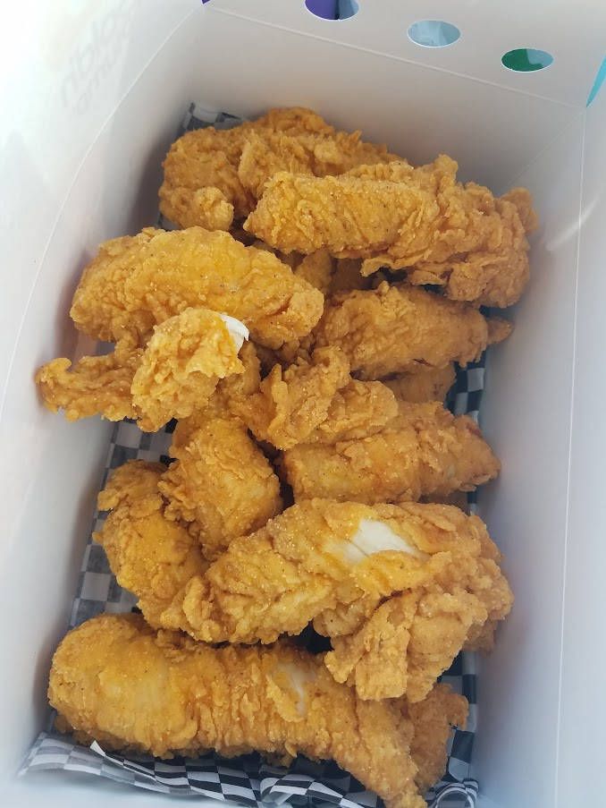 A to-go box of chicken strips