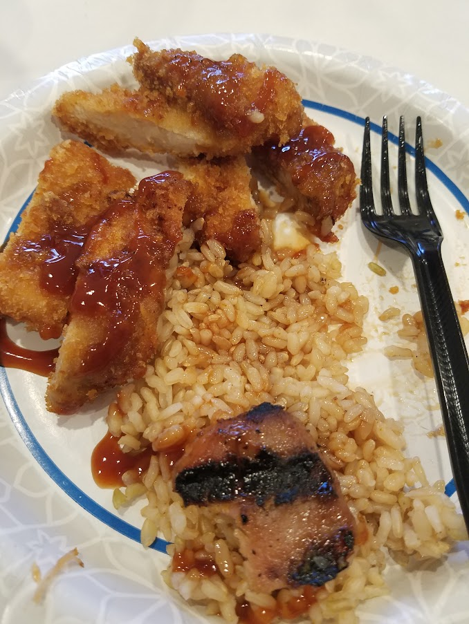 A plate with a rice, grilled and fried chicken from mobetta's in utah.