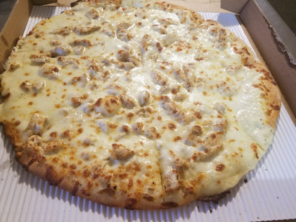 Chicken Alfredo Pizza, with cheese, alfredo sauce and chicken at The Ogden Pizzeria
