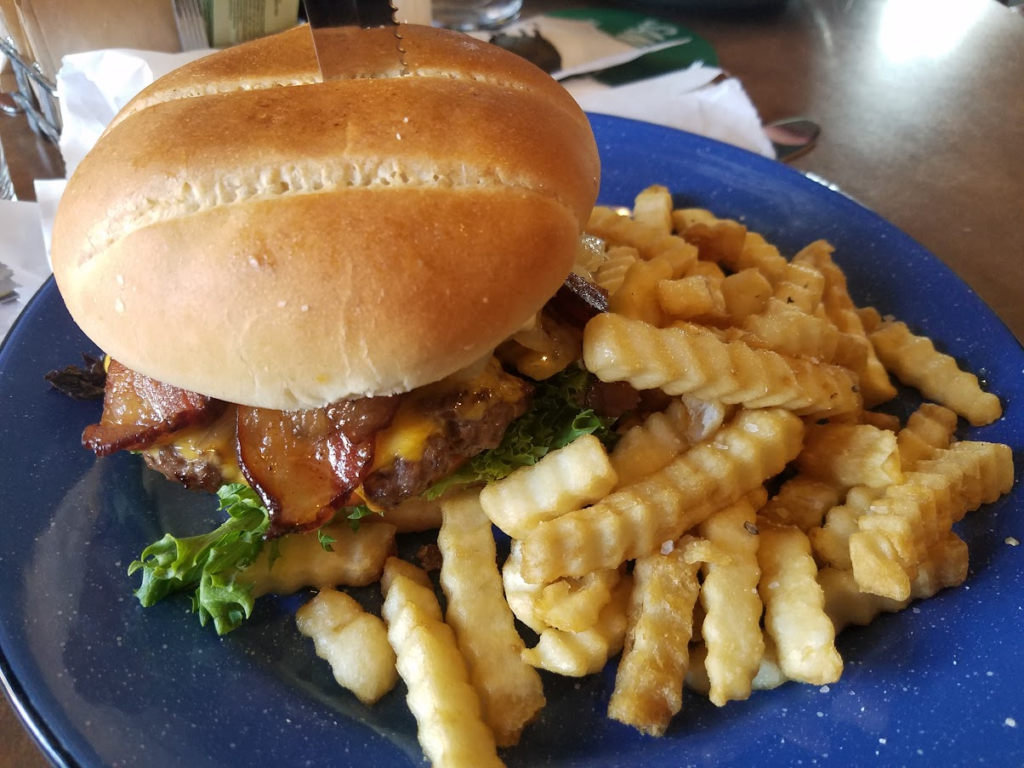 "Pig Burger" A beef burger with bacon, lettuce, cheese and crinkle cut fries at Pig and a Jelly Jar 