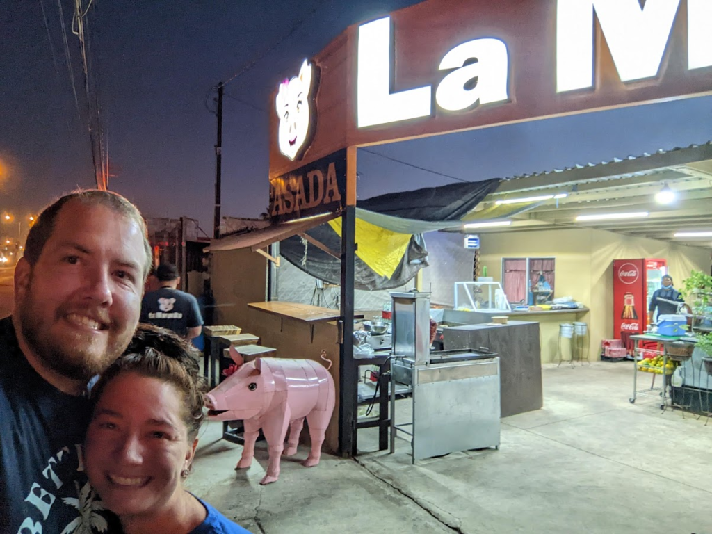 A man and a women in front of La Morenitas restaurant, in Rosarito Mexico. 